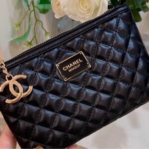 CHANEL Black Quilted Makeup Pouch with Gold CC Charm
